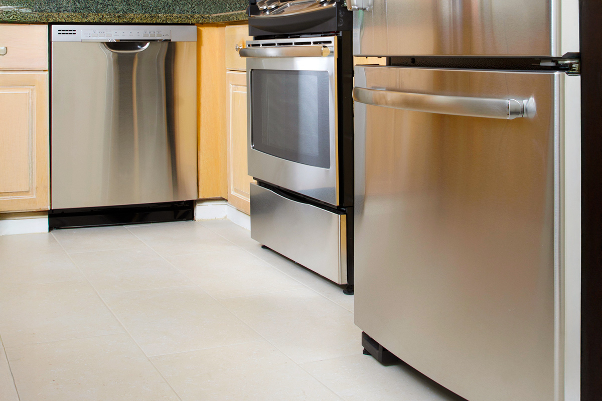 A Dust-Busting Trick for Cleaning Under Appliances
