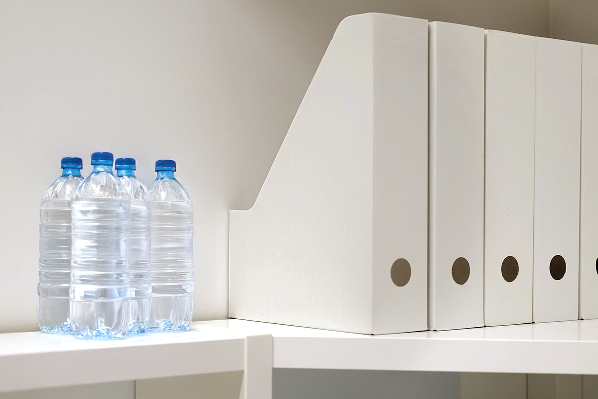Tired of Toppling Water Bottles? Try This Storage Hack
