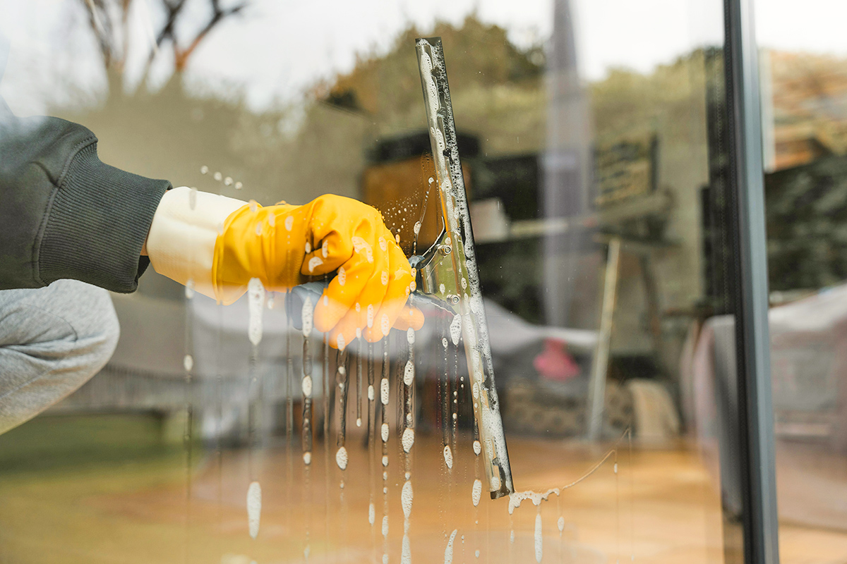 Close-up of cleaning home windows